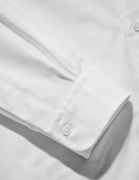 Signature six-pleat shirring at the cuffs.